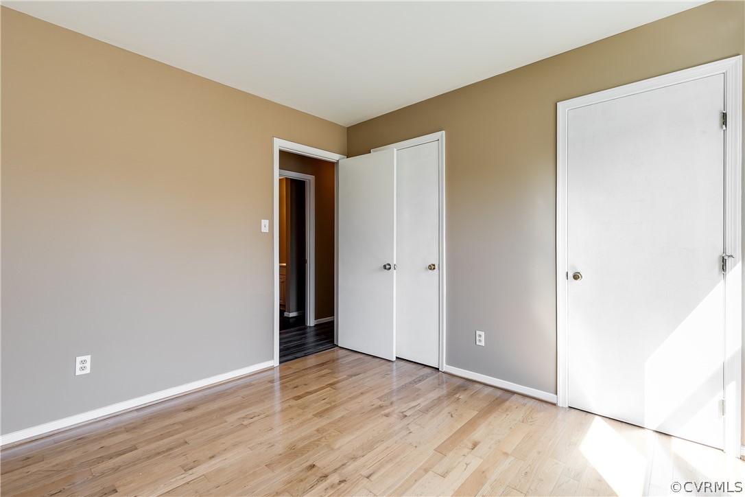 5212 South Jessup Road Chesterfield, VA 23832 - Photo 14 of 25 a view of an empty room with wooden floor