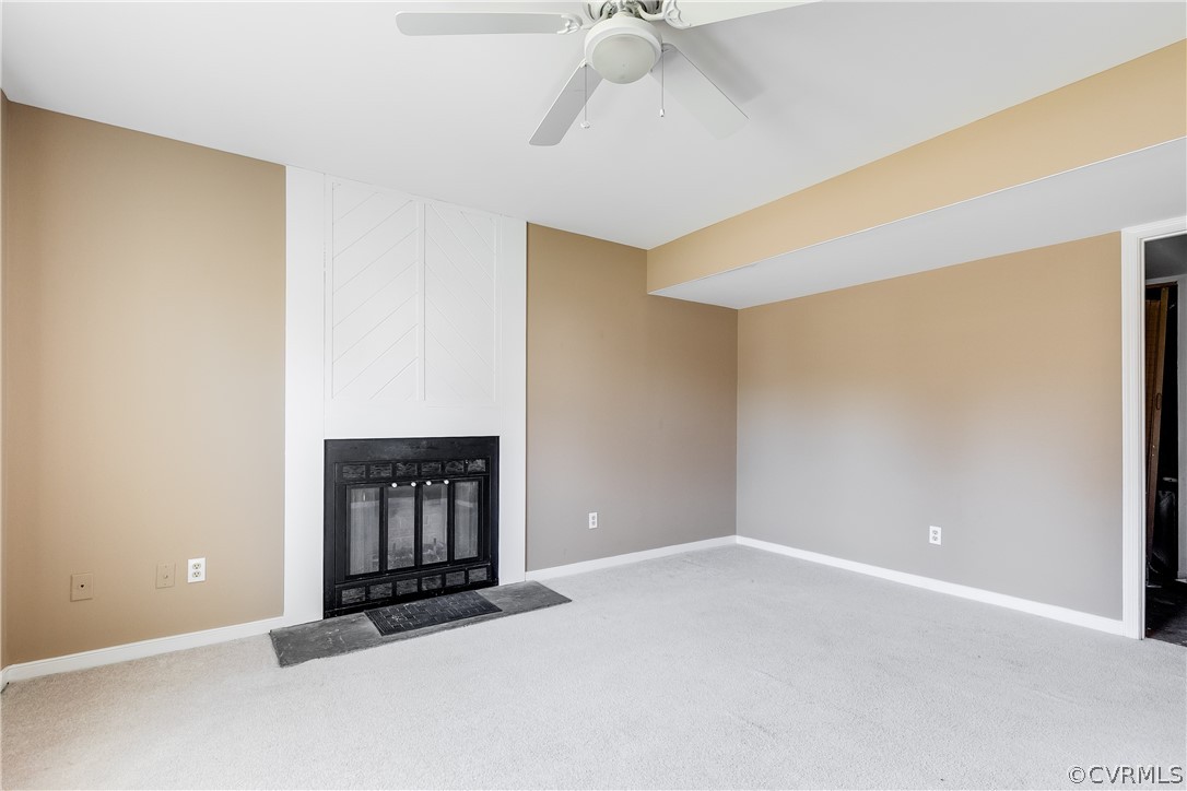 5212 South Jessup Road Chesterfield, VA 23832 - Photo 17 of 25 an empty room with a ceiling fan and a window