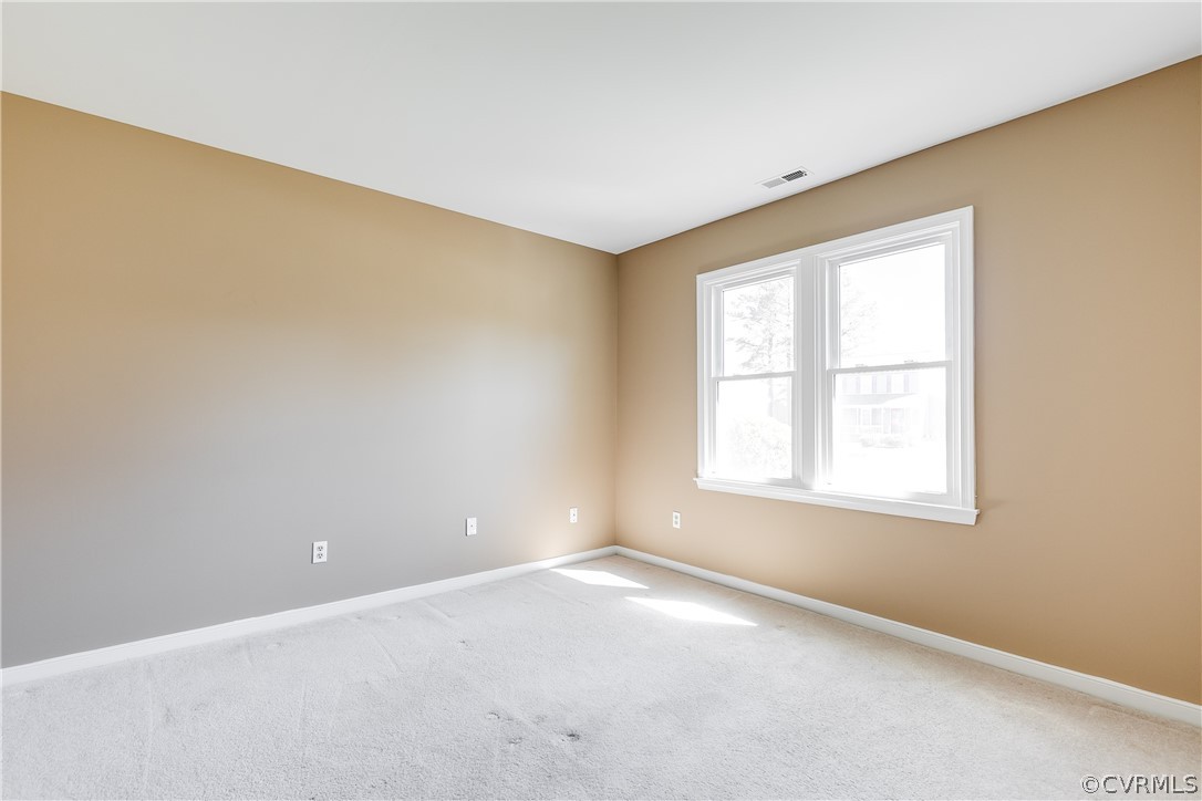 5212 South Jessup Road Chesterfield, VA 23832 - Photo 18 of 25 an empty room with a window