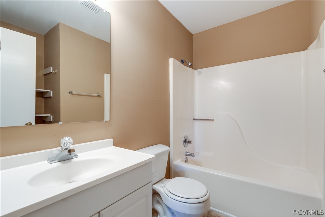 5212 South Jessup Road Chesterfield, VA 23832 - Photo 22 of 25 a bathroom with a sink a toilet and shower