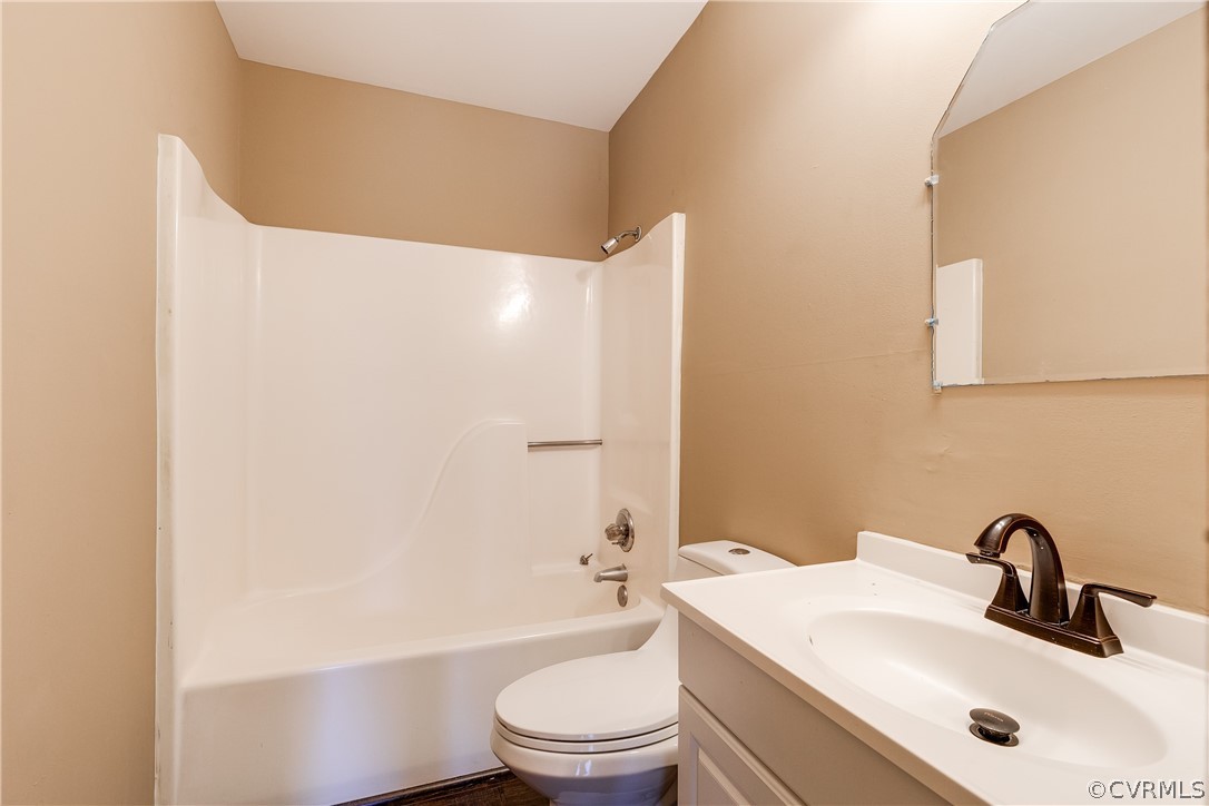 5212 South Jessup Road Chesterfield, VA 23832 - Photo 10 of 25 a bathroom with a sink a toilet and shower