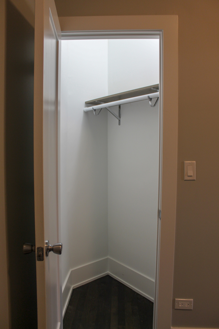 1701 West Nelson Street, Unit 1F Chicago, IL 60657 - Photo 10 of 10 a view of a room with rack on the wall