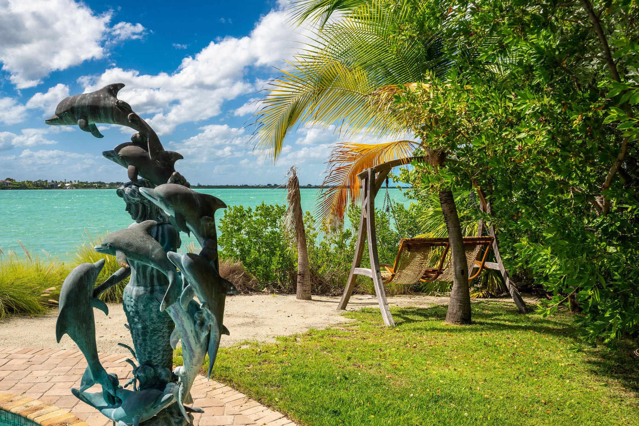 30 Cannon Royal Drive Shark Key, FL 33040 - Photo 43 of 48 DOLPHIN WATER FEATURE AND TANDEM SWING
