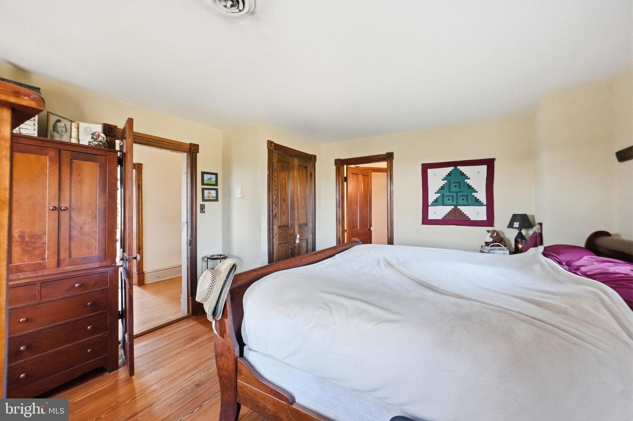 13405 John Kline Road Smithsburg, MD 21783 - Photo 24 of 96 a bedroom with a bed and a dresser