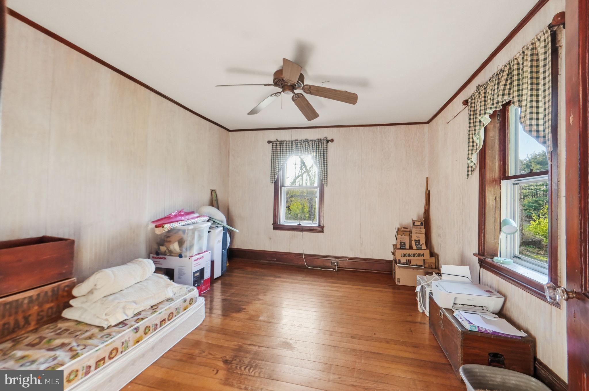 13405 John Kline Road Smithsburg, MD 21783 - Photo 29 of 96 a living room with furniture and a window
