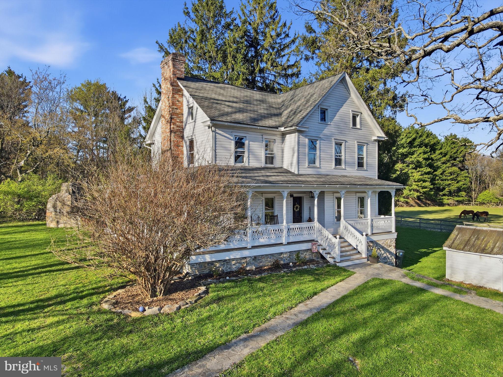 13405 John Kline Road Smithsburg, MD 21783 - Photo 5 of 96 a front view of a house with garden