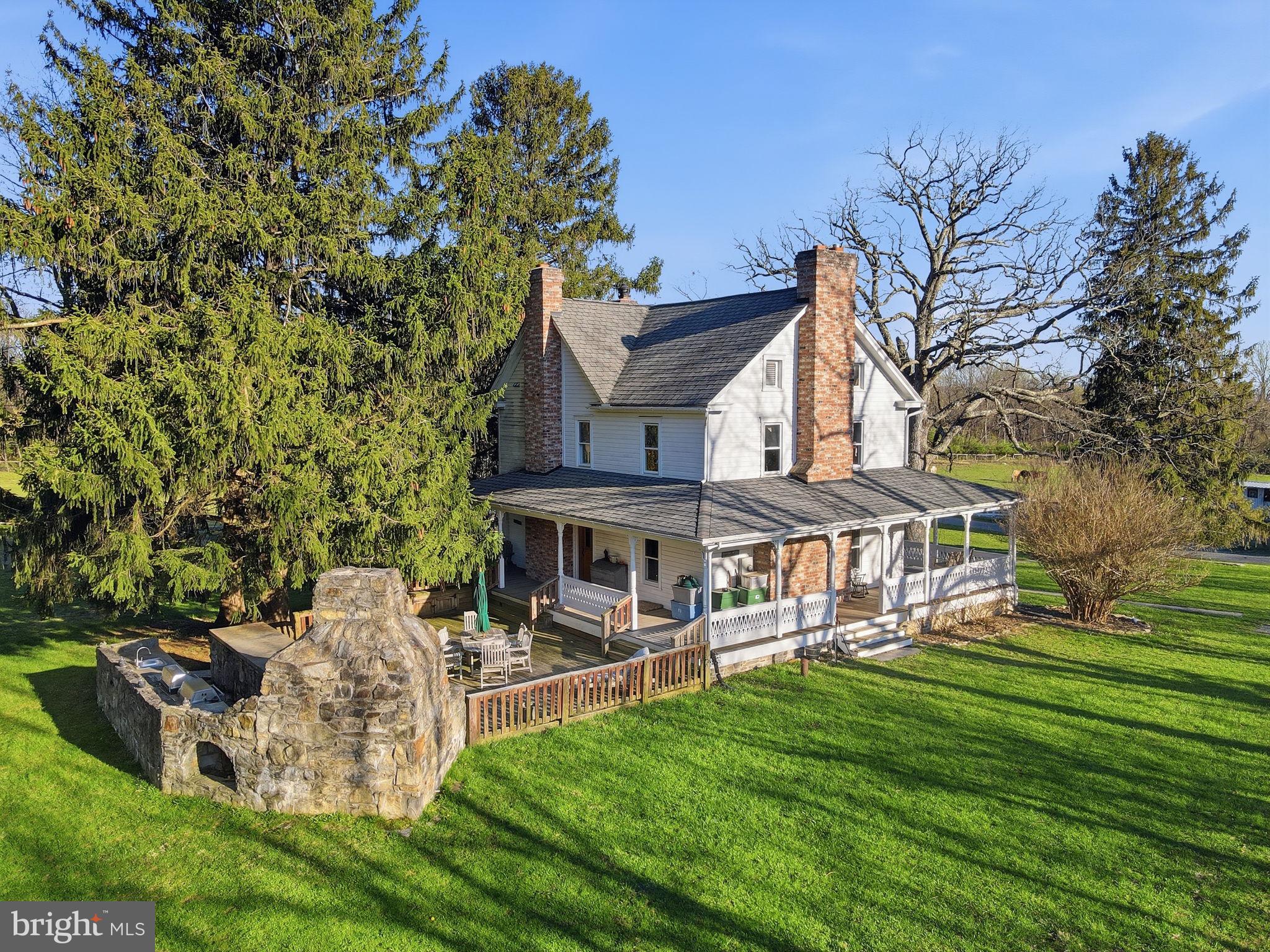 13405 John Kline Road Smithsburg, MD 21783 - Photo 70 of 96 a view of a house with a yard table and chairs