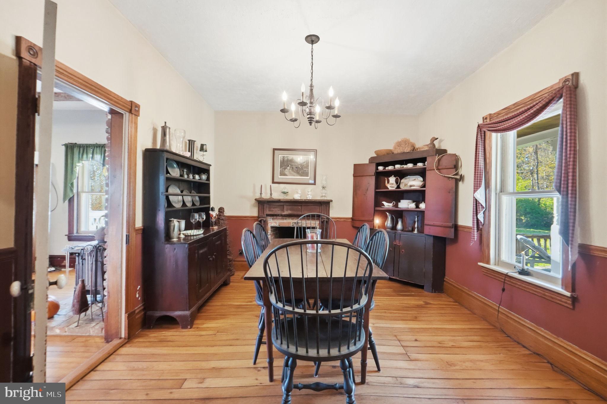 13405 John Kline Road Smithsburg, MD 21783 - Photo 8 of 96 a view of a dining room with furniture window and wooden floor