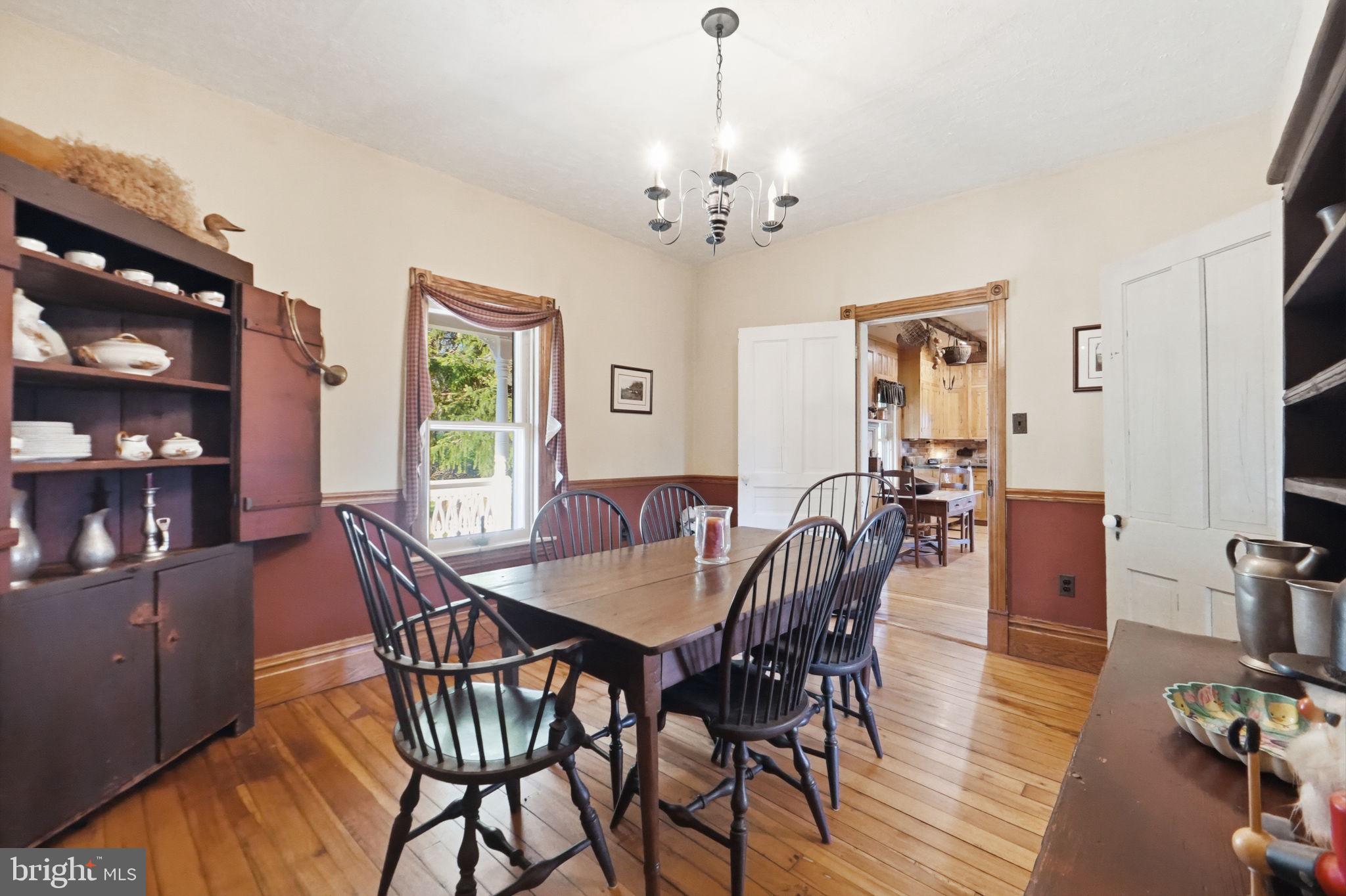 13405 John Kline Road Smithsburg, MD 21783 - Photo 9 of 96 a view of a dining room with furniture and wooden floor