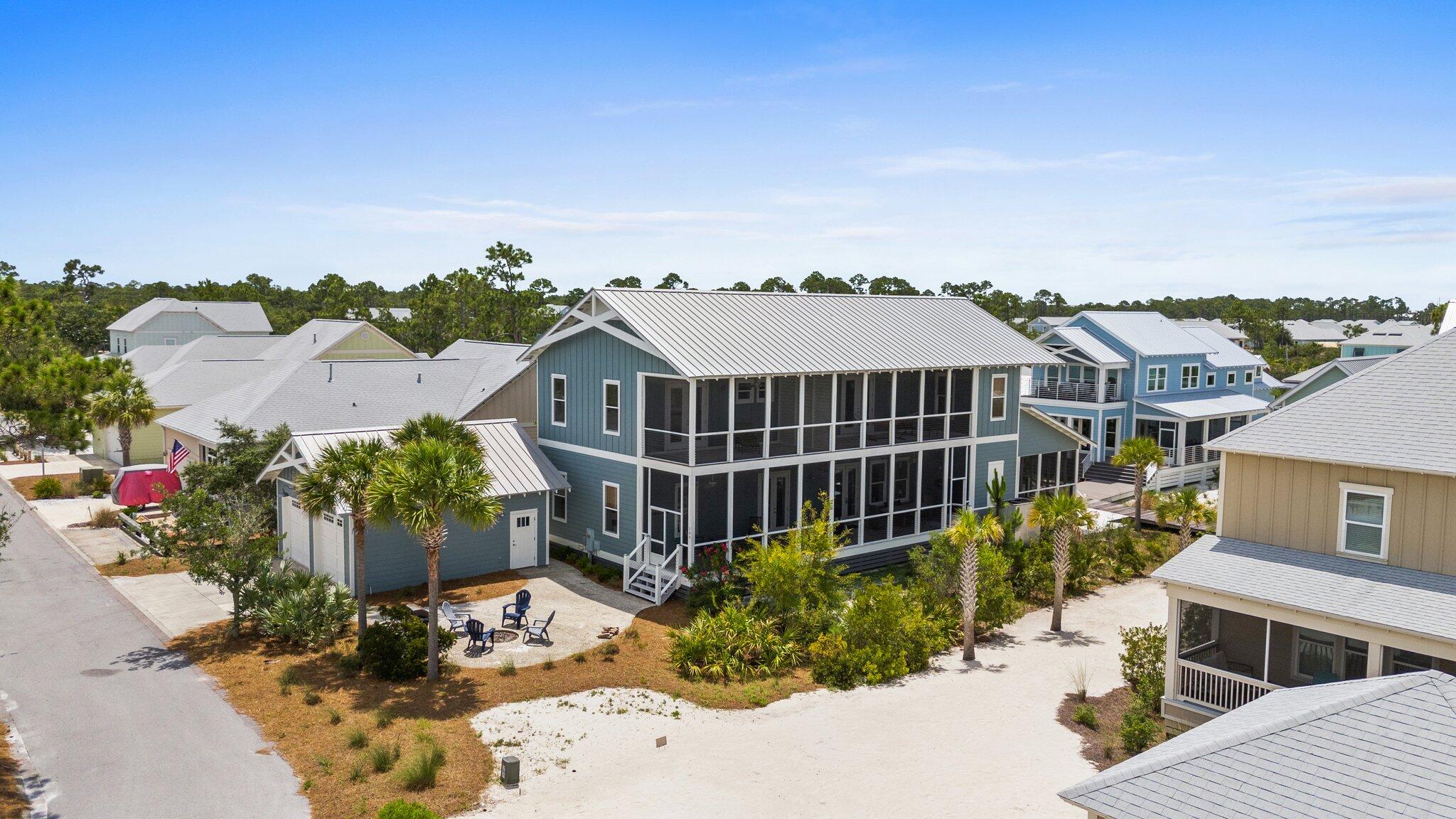 104 Pinwheel Court Port St. Joe, FL 32456 - Photo 103 of 119 a view of a house with a yard
