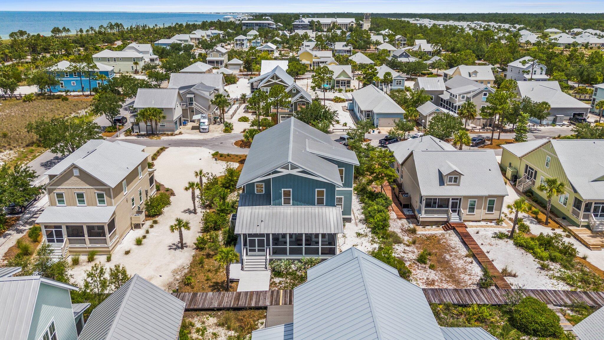 104 Pinwheel Court Port St. Joe, FL 32456 - Photo 105 of 119 an aerial view of residential houses with outdoor space