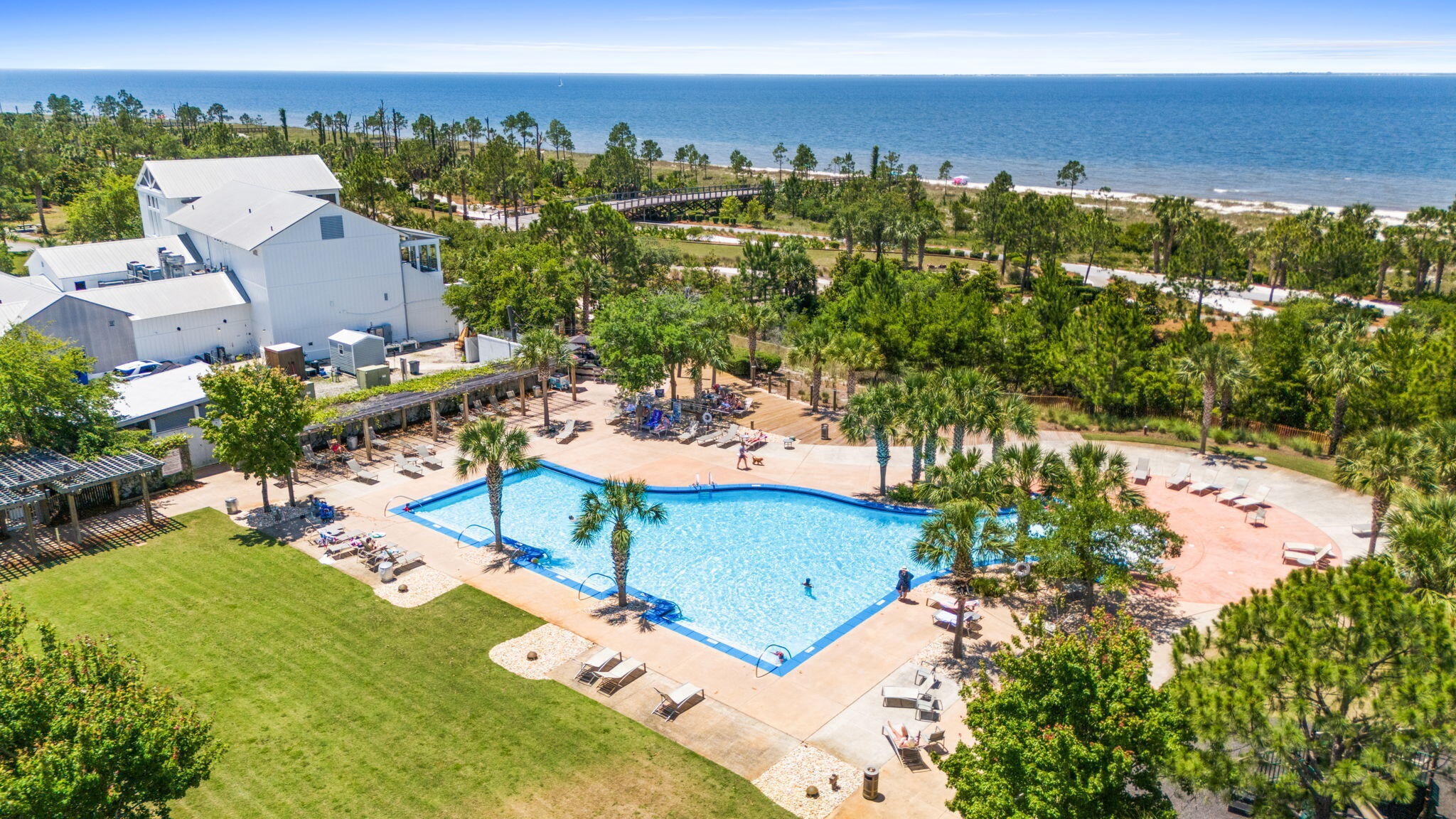 104 Pinwheel Court Port St. Joe, FL 32456 - Photo 113 of 119 an aerial view of a house with a yard