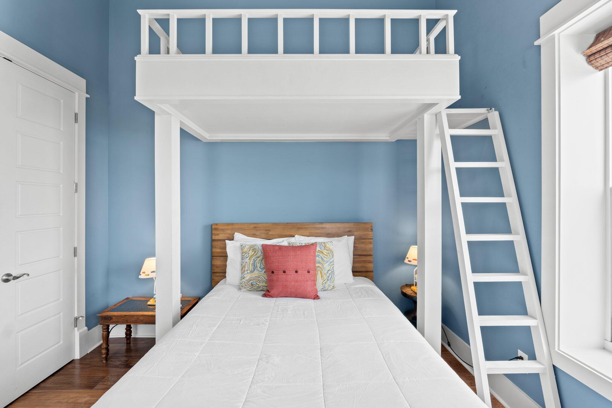 104 Pinwheel Court Port St. Joe, FL 32456 - Photo 77 of 119 a bedroom with a bed and a window