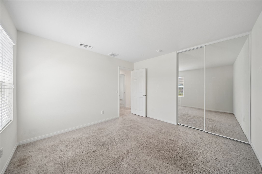 20130 Curaco Court Riverside, CA 92507 - Photo 34 of 43 Additional view of the bedroom and mirrored closet.