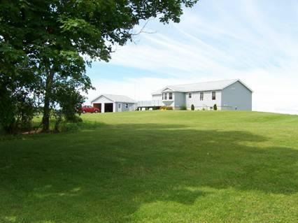 404 Gogan Road Benton, ME 04901 - Photo 1 of 22 Exterior Front. Open and lush front...