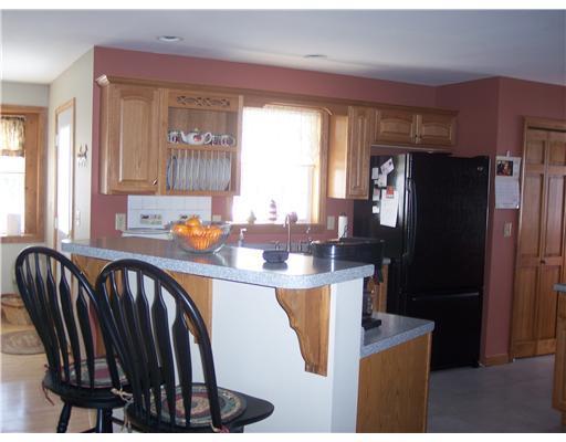 404 Gogan Road Benton, ME 04901 - Photo 8 of 22 Kitchen. You can "belly-up" to the...