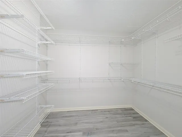 a view of a livingroom with wooden floor