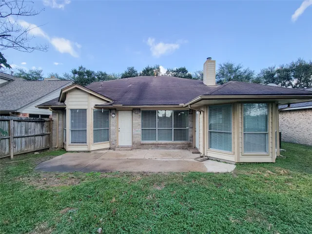 a backyard view of a house