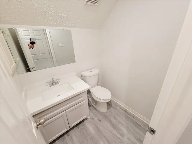 a view of livingroom with an empty room