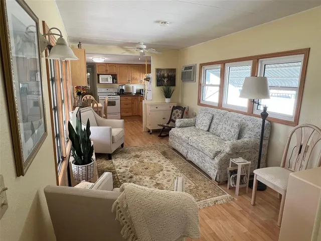 a living room with furniture and a window