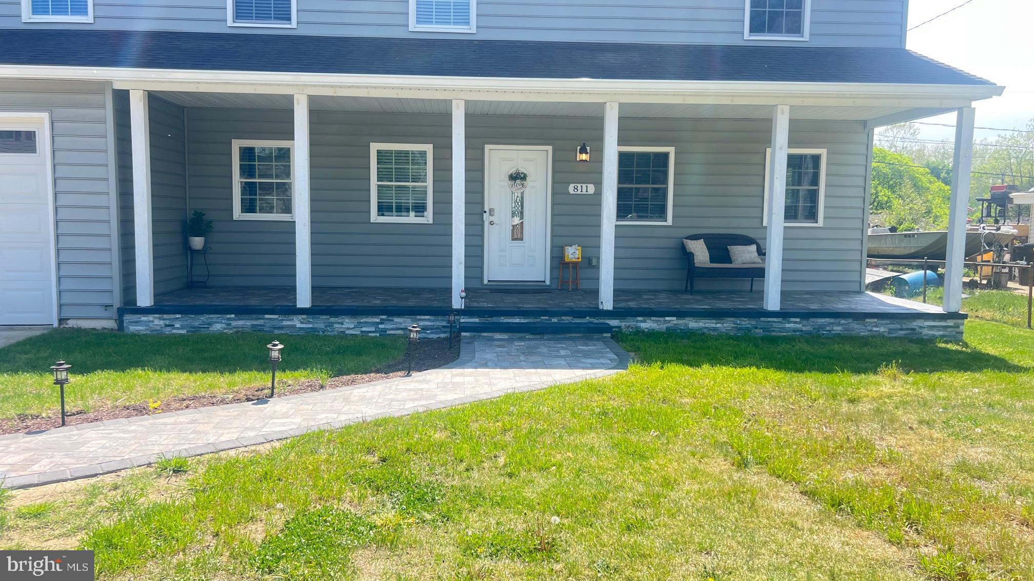 811 223rd Street Pasadena, MD 21122 - Photo 2 of 31 a view of a house with swimming pool