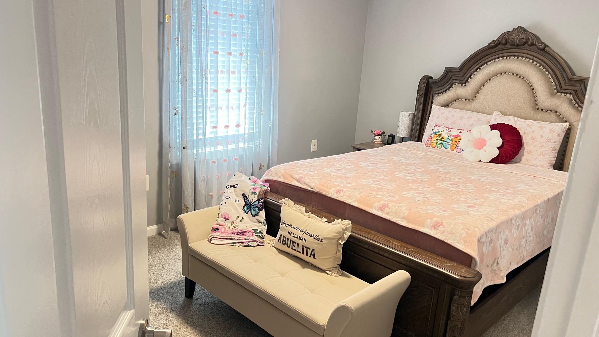 811 223rd Street Pasadena, MD 21122 - Photo 21 of 31 a bedroom with a bed and a window