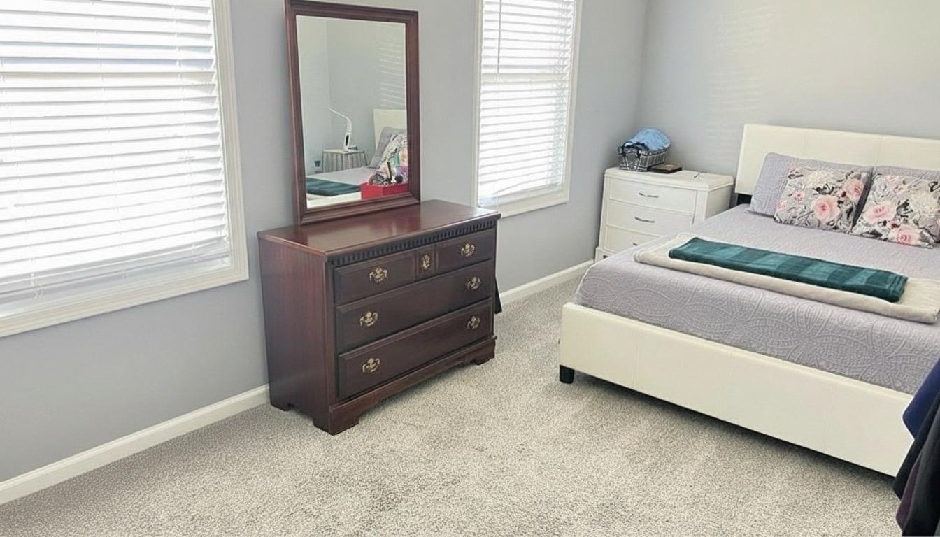 811 223rd Street Pasadena, MD 21122 - Photo 22 of 31 a bedroom with a bed and window