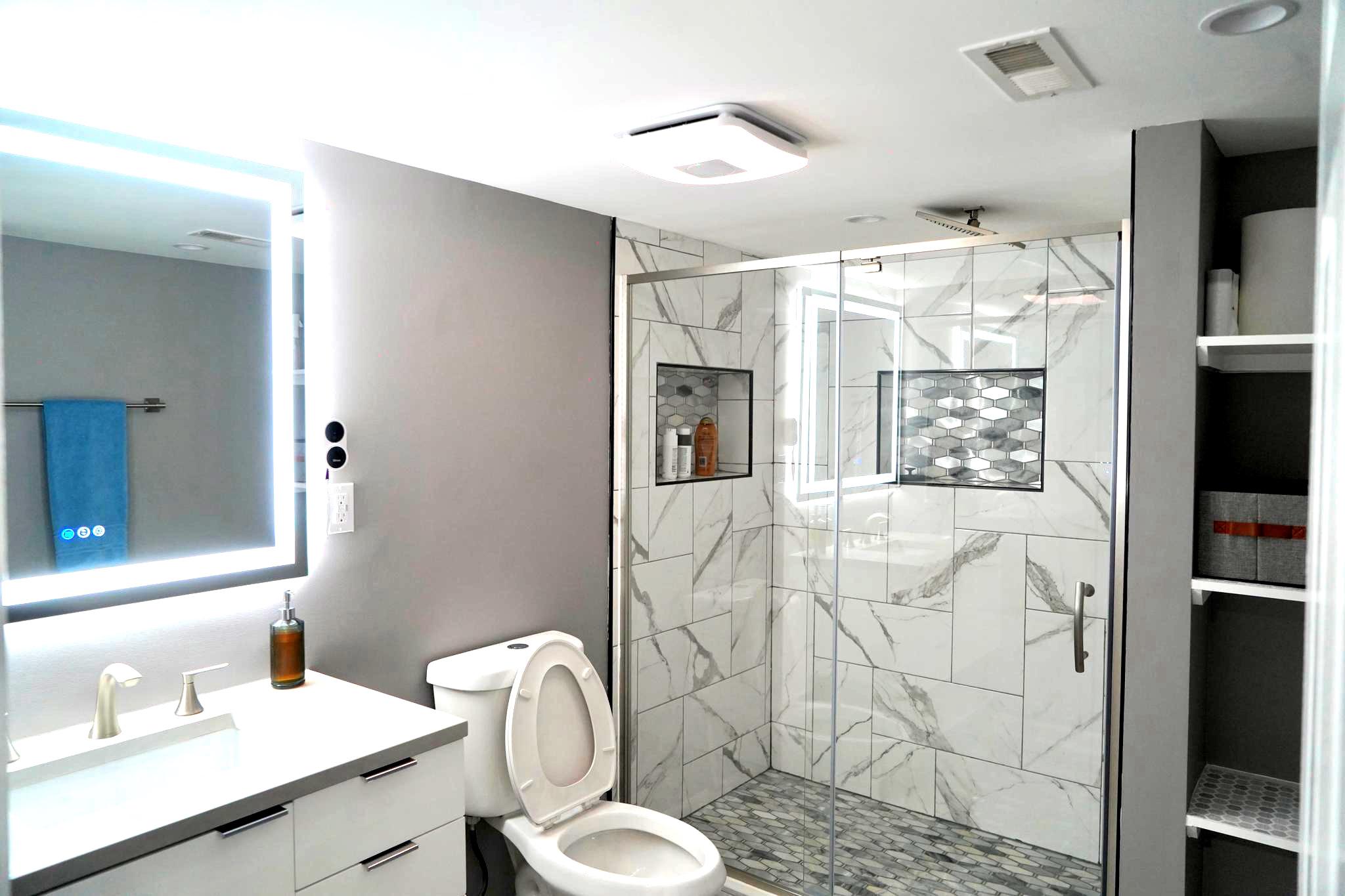 811 223rd Street Pasadena, MD 21122 - Photo 28 of 31 a bathroom with a sink toilet and shower