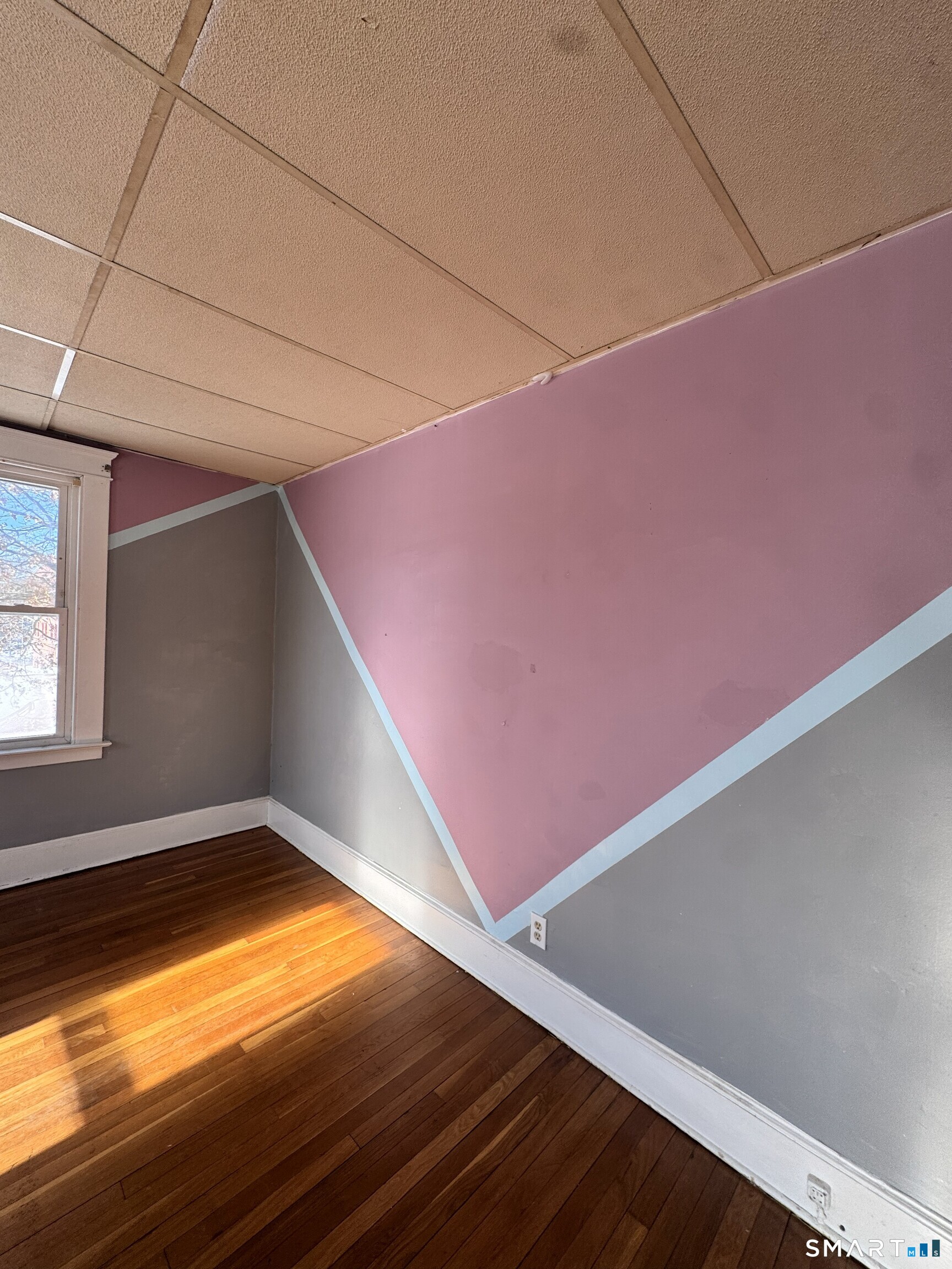 269 Helen Street Hamden, CT 06514 - Photo 13 of 16 a view of empty room with window