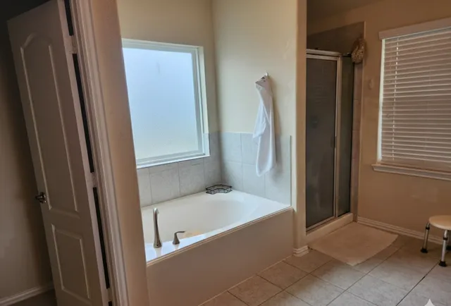 a bathroom with a sink toilet and mirror
