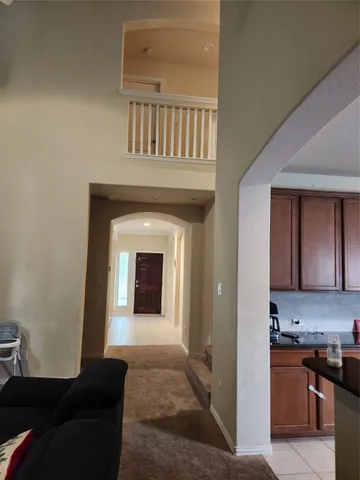 a kitchen with stainless steel appliances a sink stove and refrigerator