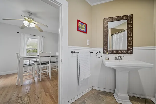 a kitchen with a stove a sink and a refrigerator