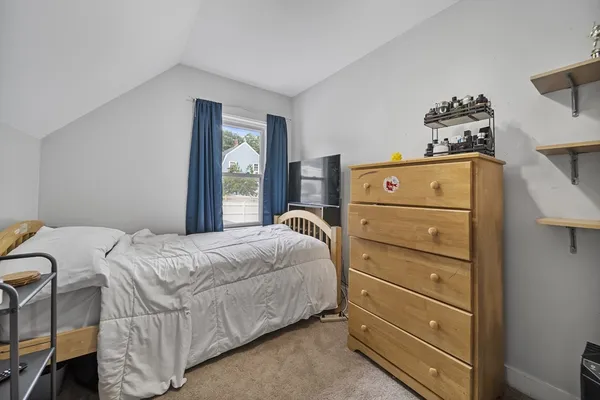 a view of a house with swimming pool and a yard