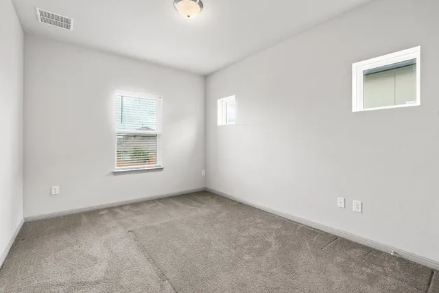 a view of a kitchen with wooden floor and a kitchen space