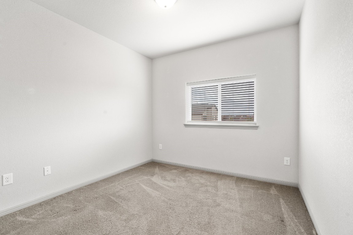 5913 B Charles Merle Dr., Unit 16 Austin, TX 78747 - Photo 15 of 35 an empty room with a window