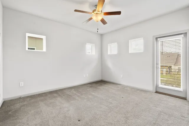 a view of an empty room and window