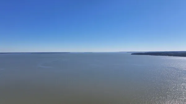 a view of a lake with a mountain in the background