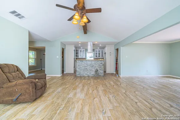 a view of livingroom with furniture and wooden floor
