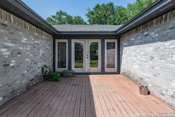a front view of a house with a wooden floor