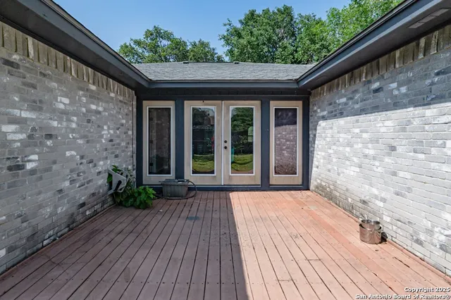 a front view of a house with a wooden floor