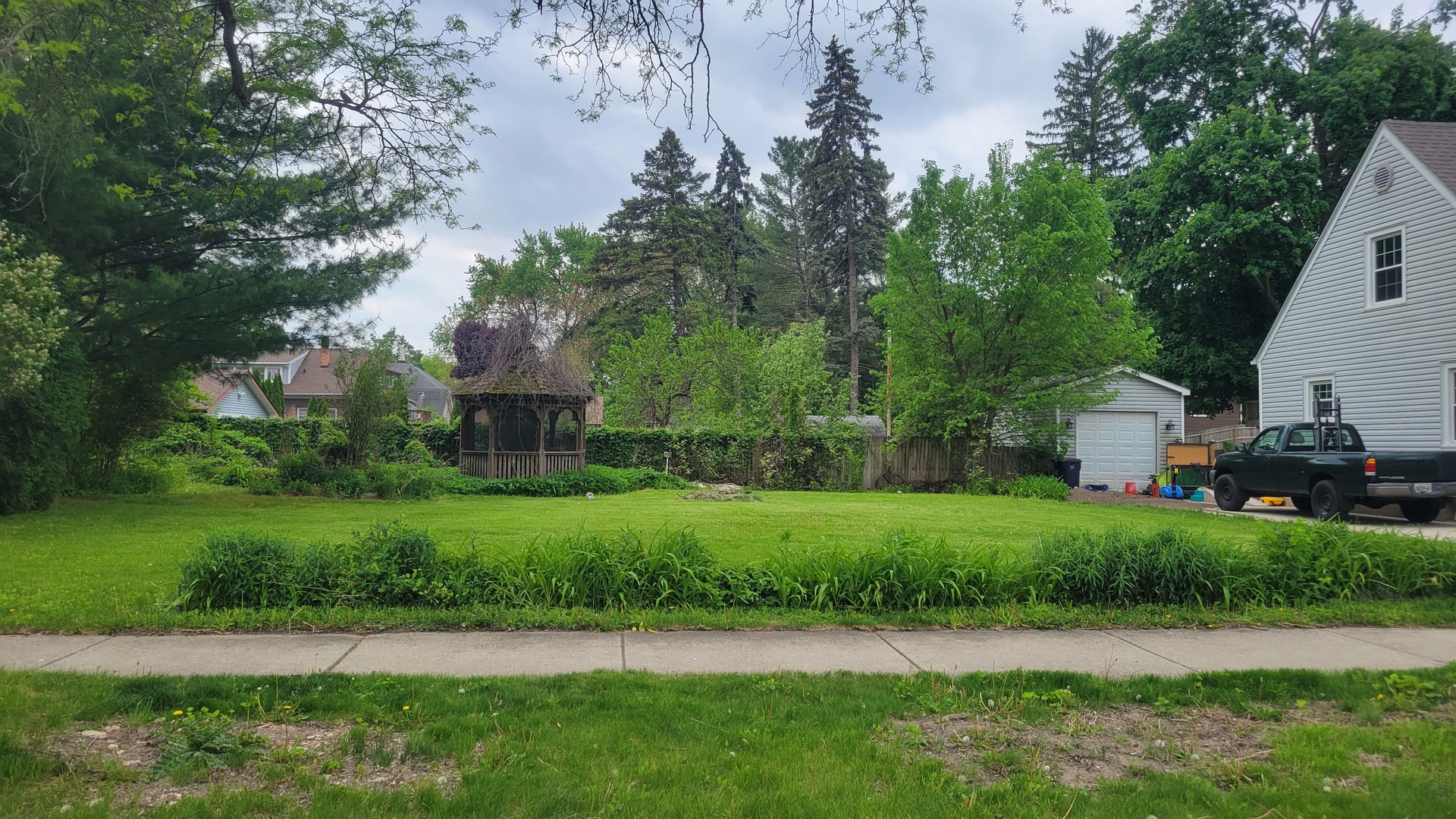 Vacant Lot Parcel 1 Vacant Congdon Avenue Elgin, IL 60120 - Photo 1 of 4 a view of a back yard