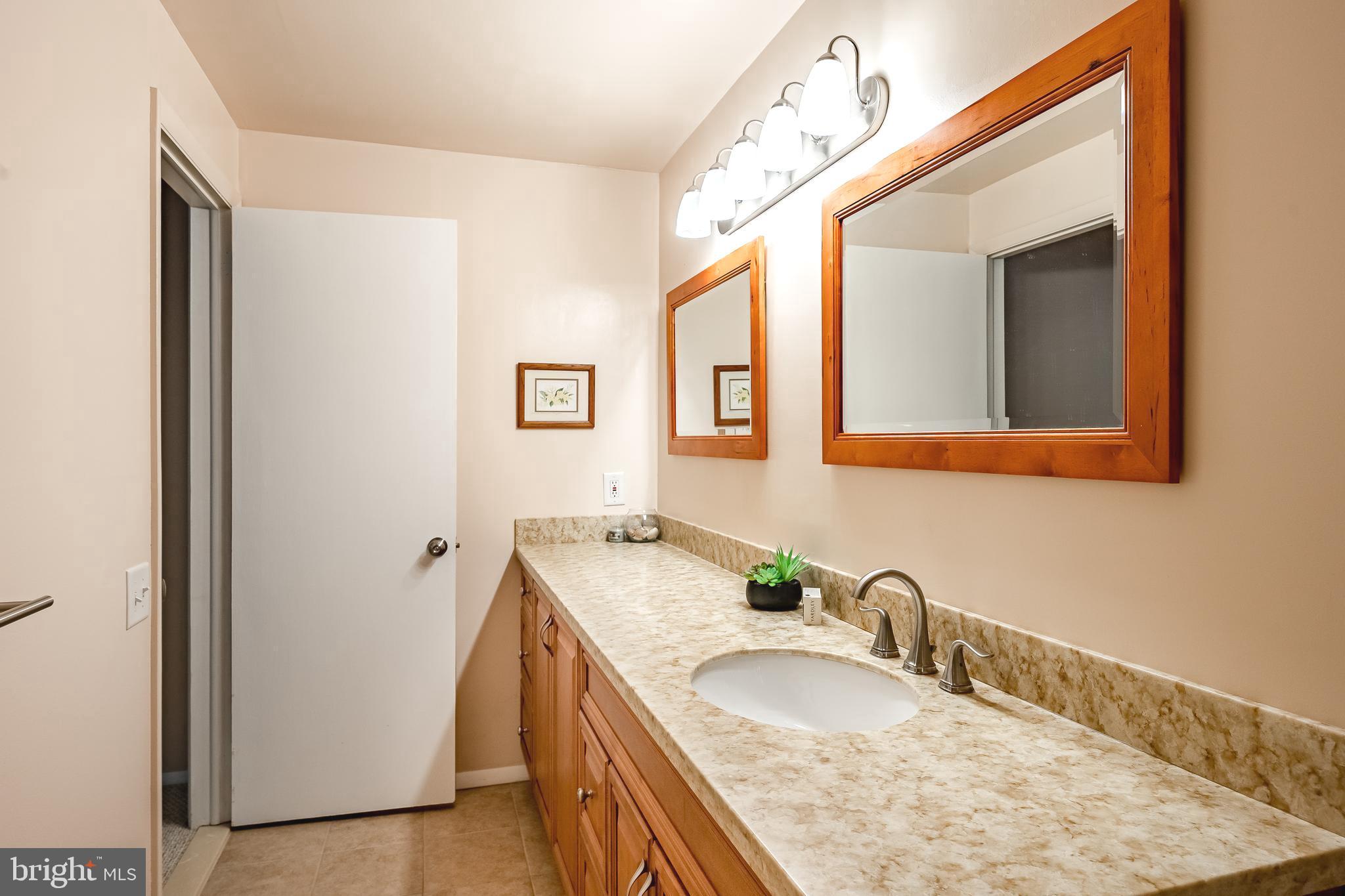 809 Old State Road Berwyn, PA 19312 - Photo 38 of 49 Long counter top in renovated bathroom