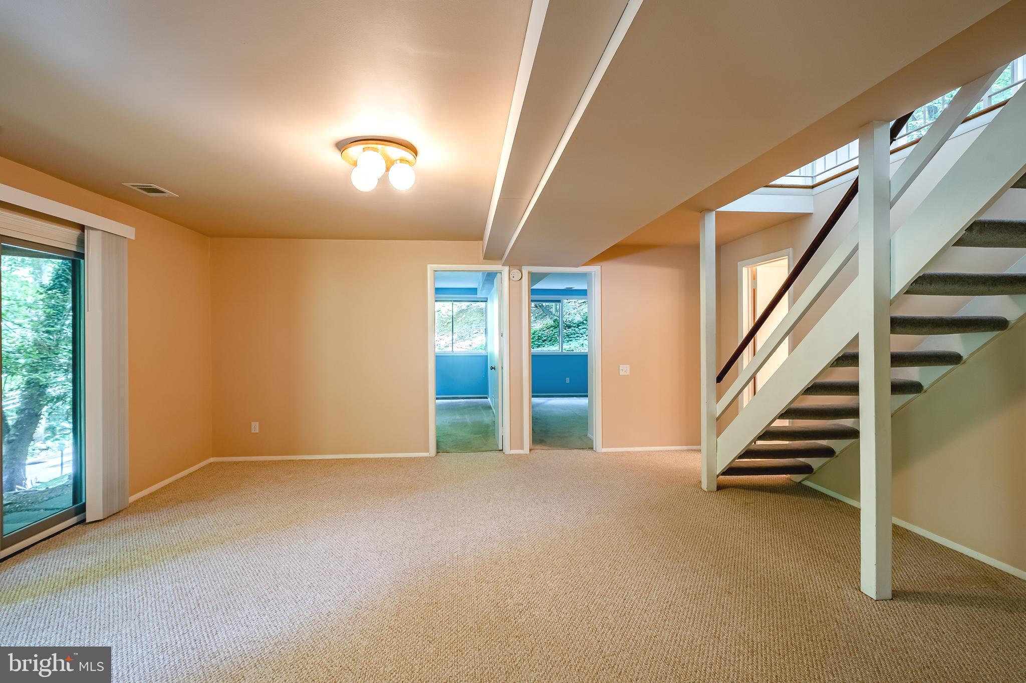 809 Old State Road Berwyn, PA 19312 - Photo 39 of 49 Lower level family room with open staircase