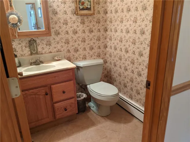 a bathroom with a toilet and a sink