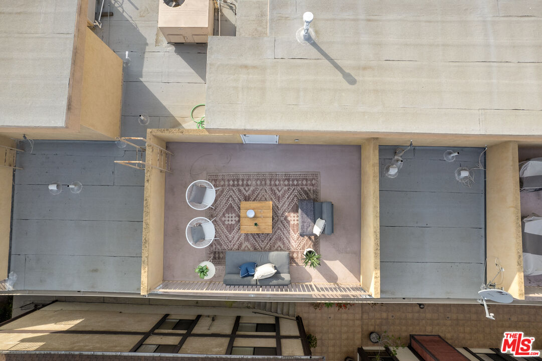 1747 South Barrington Avenue, Unit 103 Los Angeles, CA 90025 - Photo 40 of 45 a front view of a house with windows