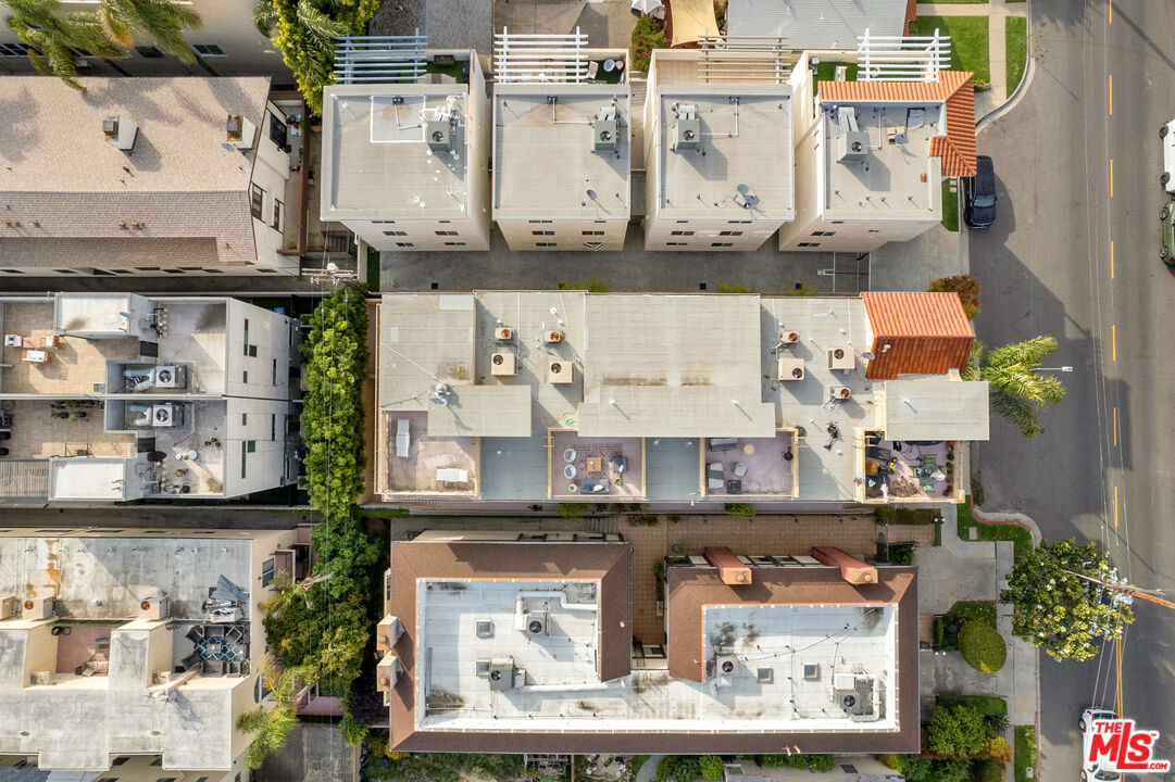 1747 South Barrington Avenue, Unit 103 Los Angeles, CA 90025 - Photo 41 of 45 an aerial view of a kitchen with stainless steel appliances