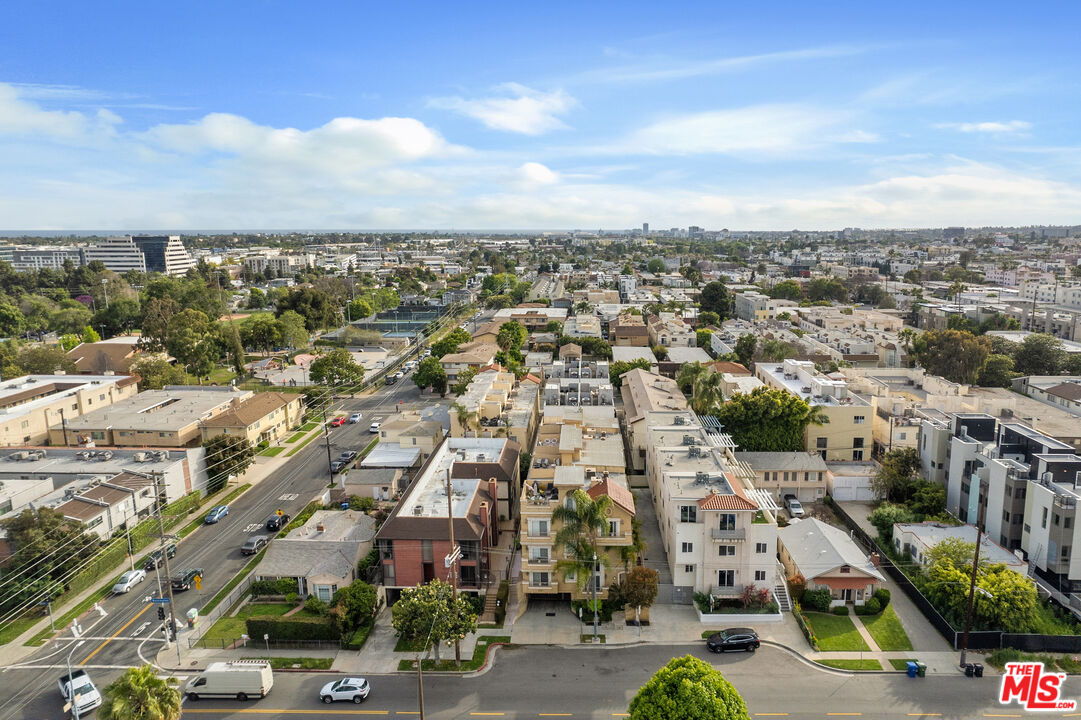 1747 South Barrington Avenue, Unit 103 Los Angeles, CA 90025 - Photo 42 of 45 an aerial view of a city with lots of residential buildings