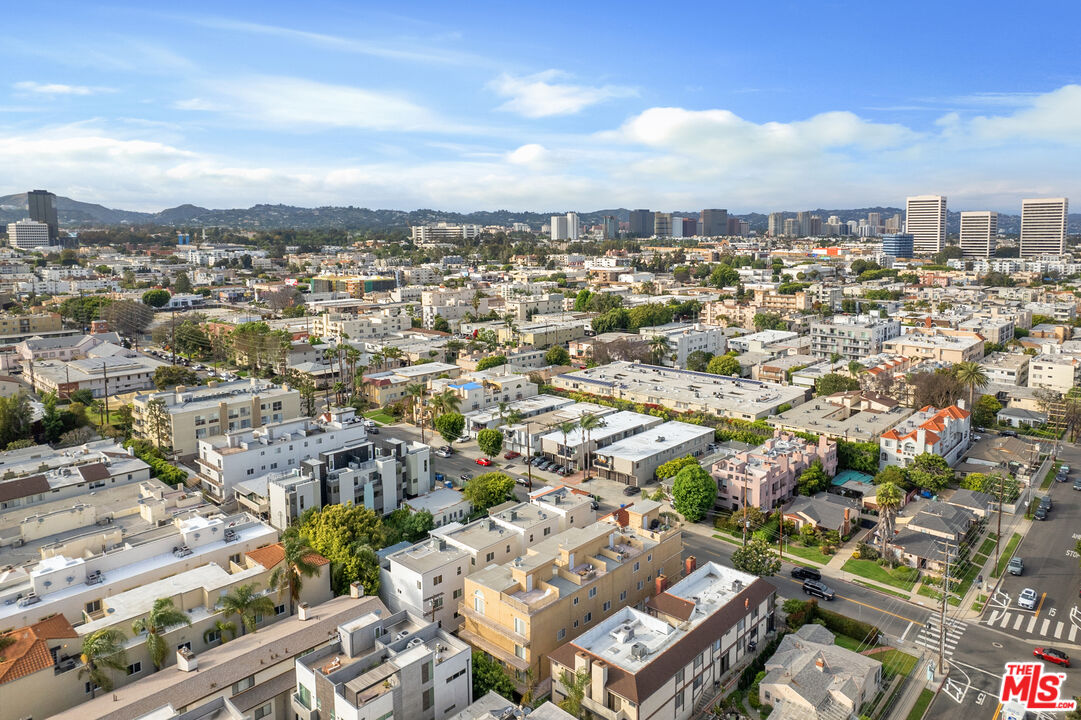 1747 South Barrington Avenue, Unit 103 Los Angeles, CA 90025 - Photo 43 of 45 an aerial view of a city with lots of residential buildings