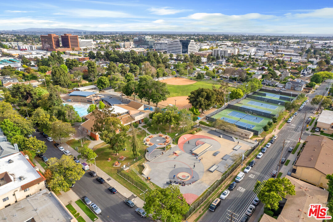 1747 South Barrington Avenue, Unit 103 Los Angeles, CA 90025 - Photo 44 of 45 an aerial view of residential houses with outdoor space