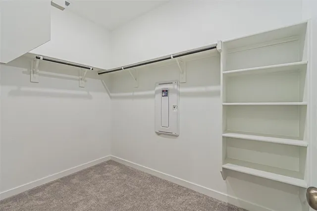 a view of an empty walk in closet